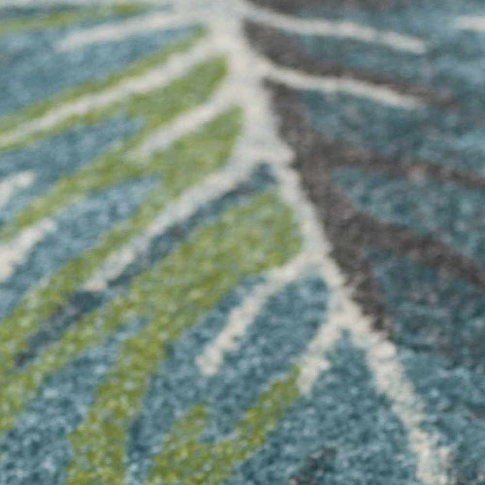 7' X 10' Beige Teal And Green Tropical Botanical Area Rug