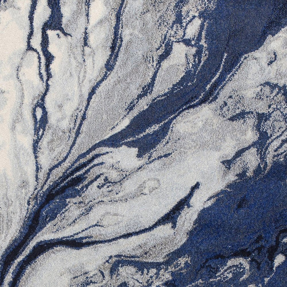 7' X 10' Blue Gray And Ivory Abstract Area Rug