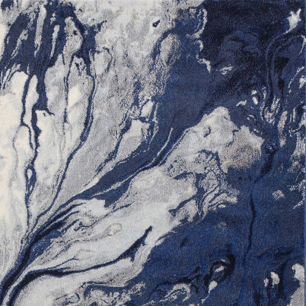 7' X 10' Blue Gray And Ivory Abstract Area Rug