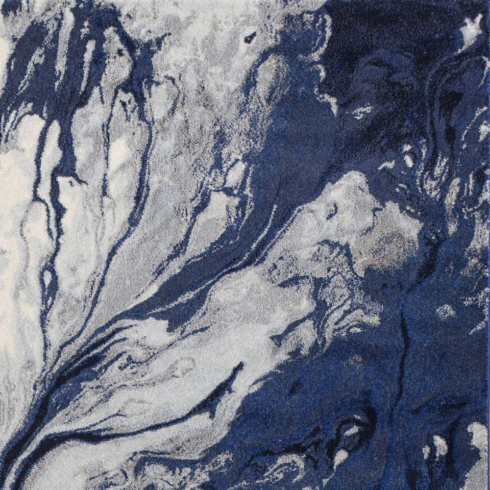7' X 10' Blue Gray And Ivory Abstract Area Rug