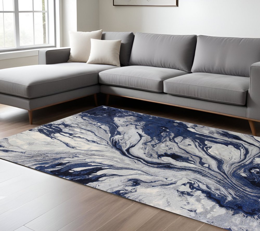 7' X 10' Blue Gray And Ivory Abstract Area Rug