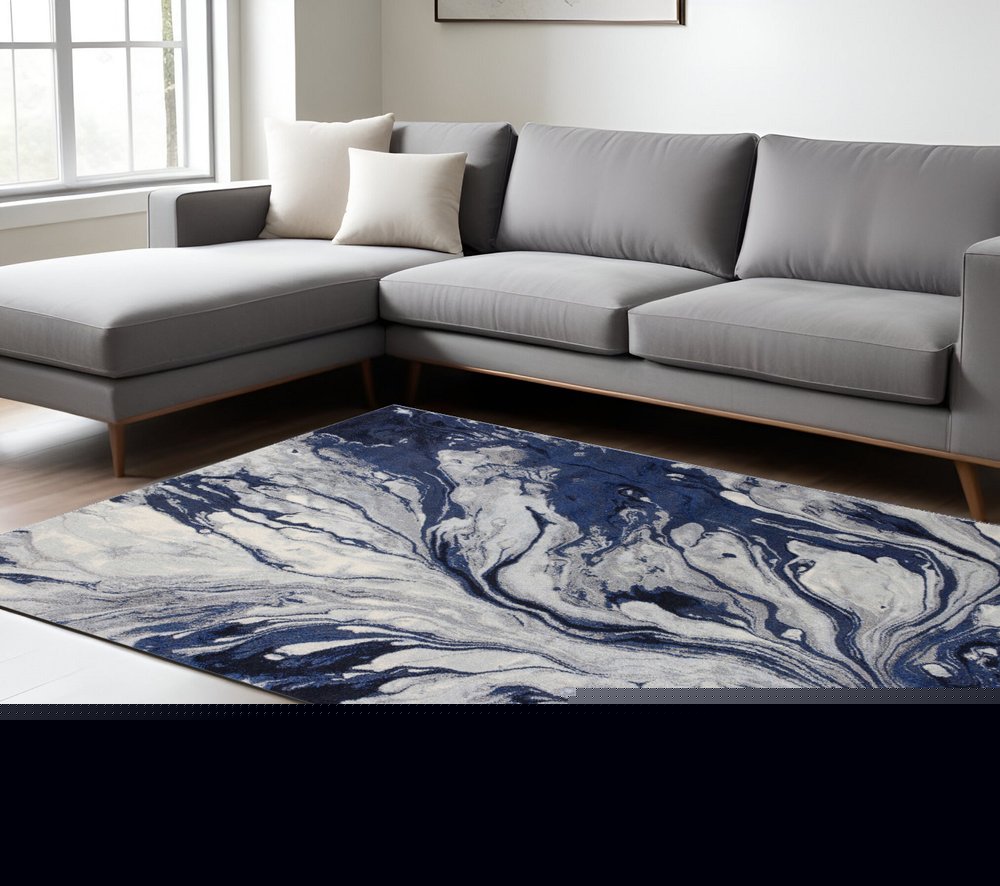 7' X 10' Blue Gray And Ivory Abstract Area Rug
