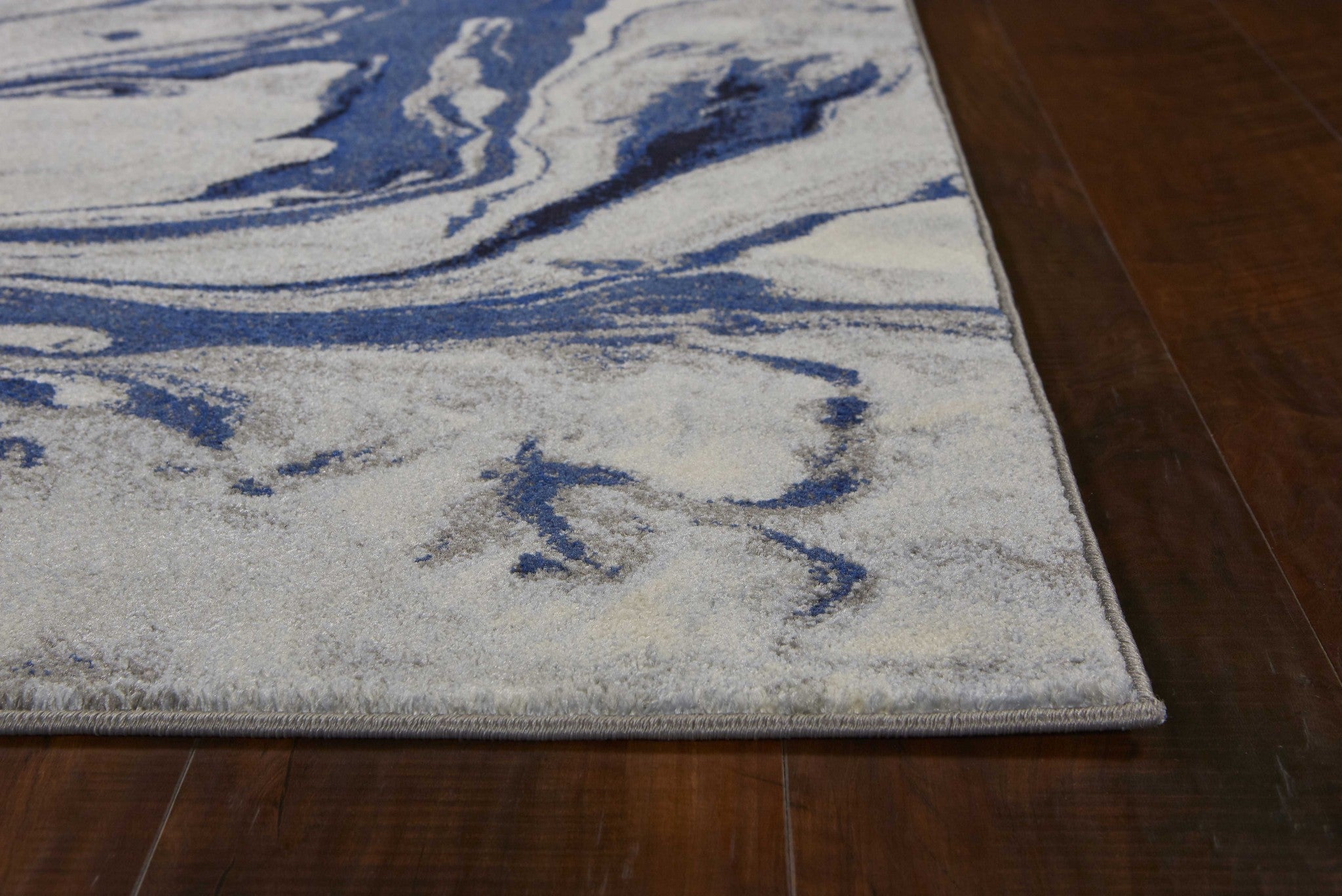 5' X 8' Blue Gray And Ivory Abstract Area Rug