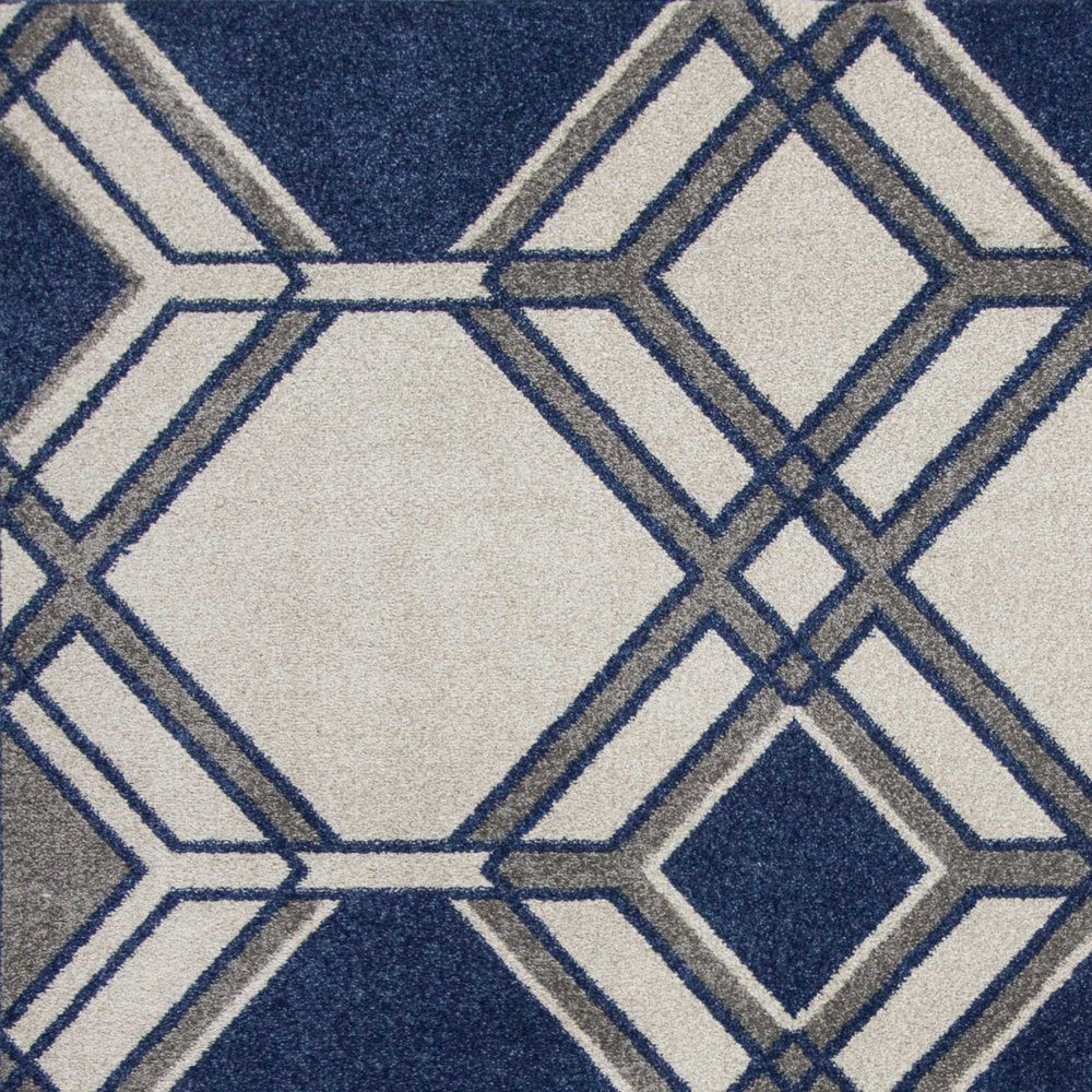 8' X 11' Blue Ivory And Gray Geometric Area Rug