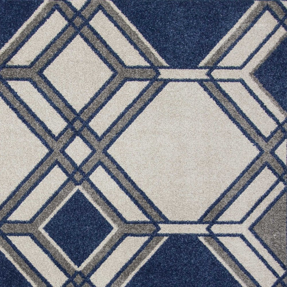 8' X 11' Blue Ivory And Gray Geometric Area Rug