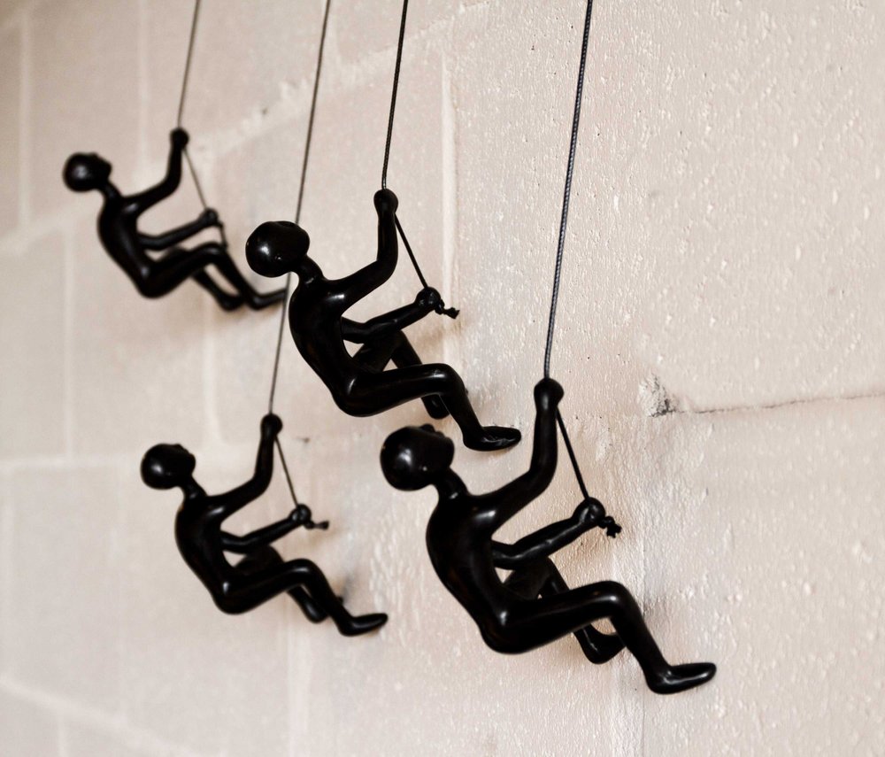 Set of Four Black Resin Climbing Man Hanging Dimensional Sculpture