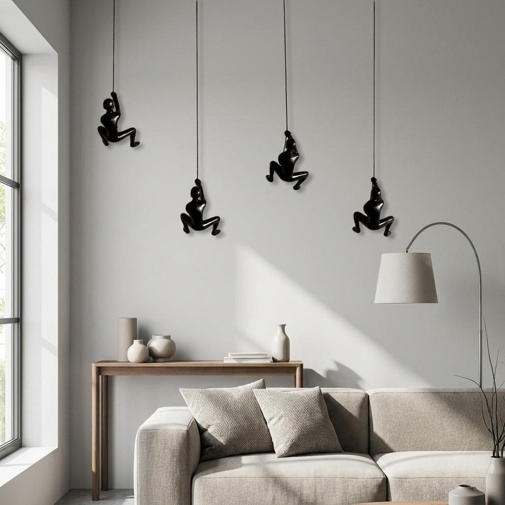 Set of Four Black Resin Climbing Man Hanging Dimensional Sculpture