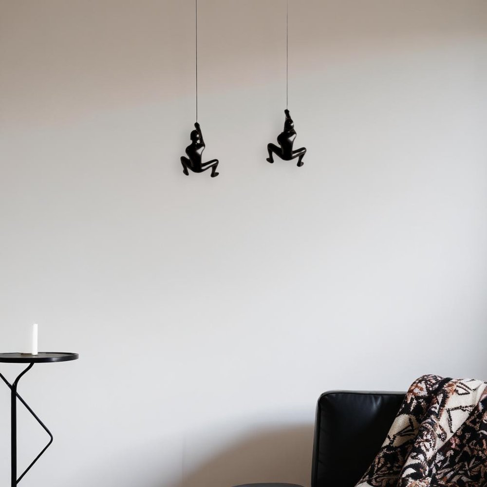 Set of Two Black Resin Climbing Man Hanging Dimensional Sculpture