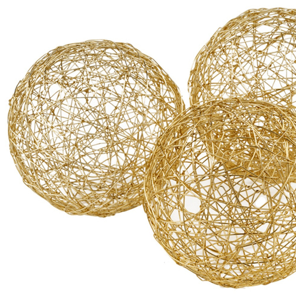 Set of Three Gold Aluminum Decorative Orbs