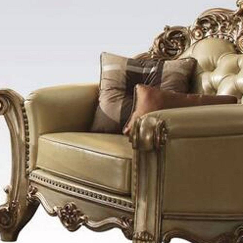 48" Bone And Gold Faux Leather Tufted Chair and a Half And Toss Pillows