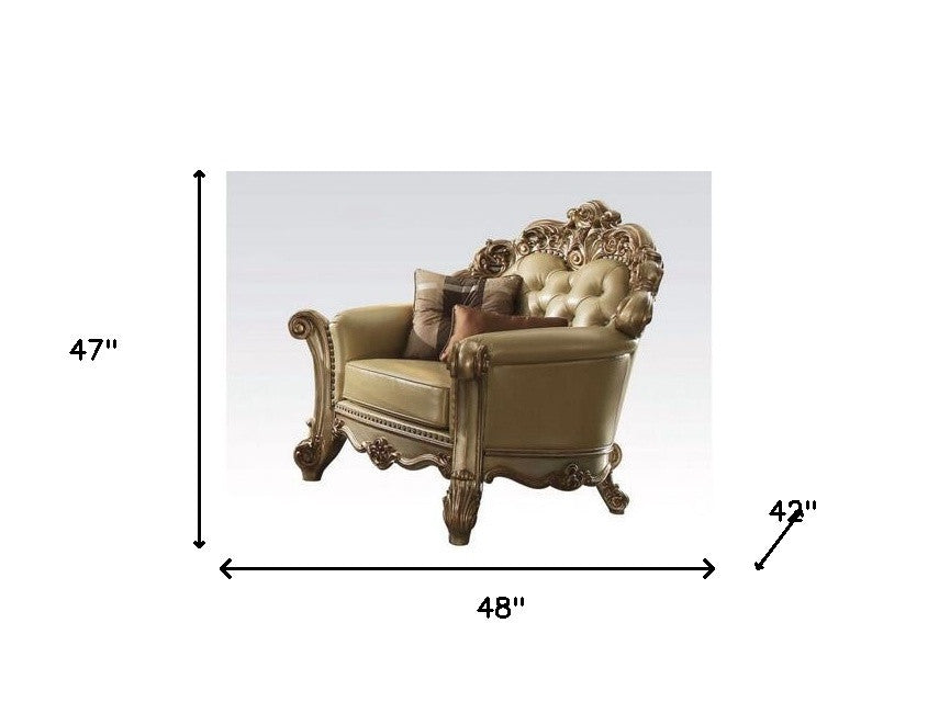 48" Bone And Gold Faux Leather Tufted Chair and a Half And Toss Pillows