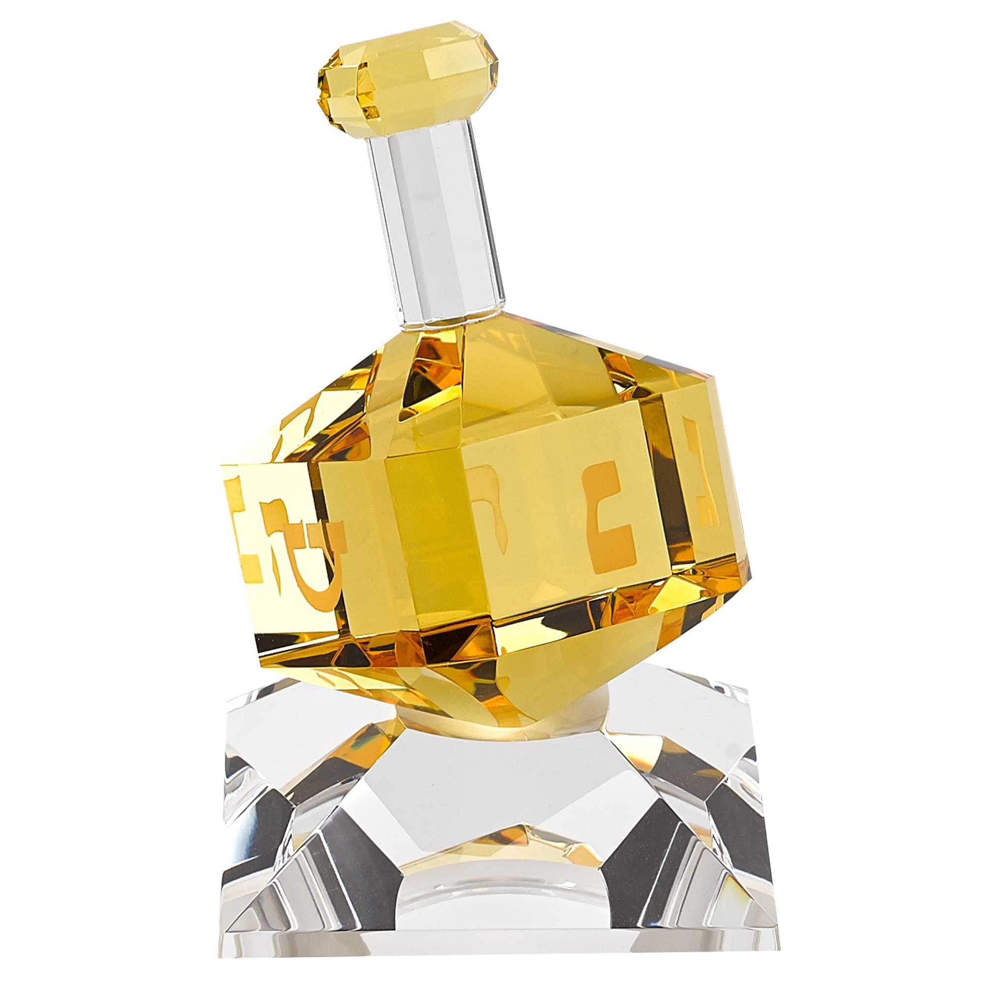 3 Mouth Blown Amber Dreidel On Crystal Stand
