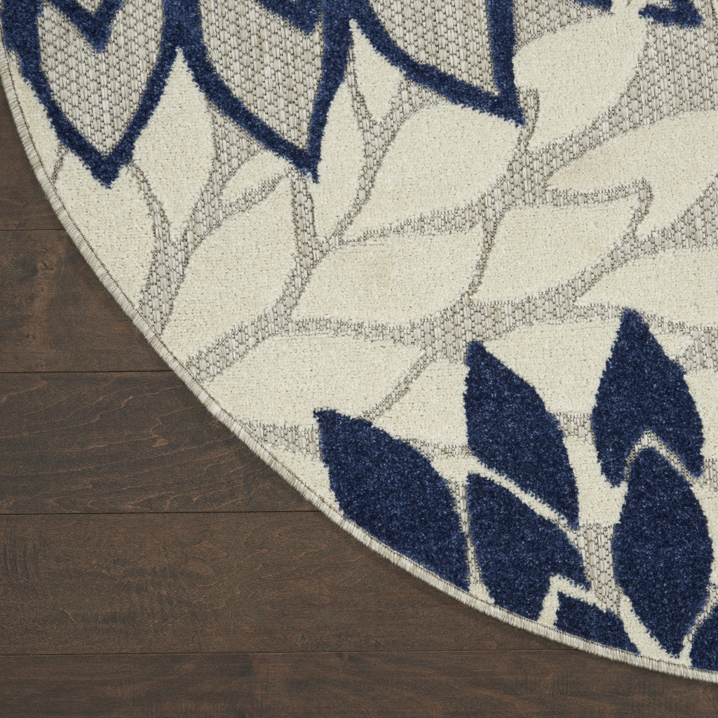 4' Ivory And Blue Round Indoor Outdoor Area Rug