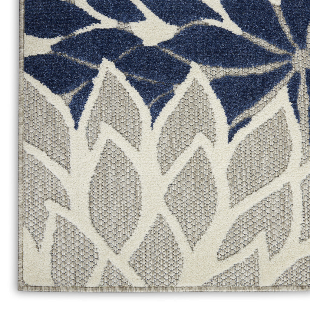 7' X 10' Ivory And Blue Indoor Outdoor Area Rug