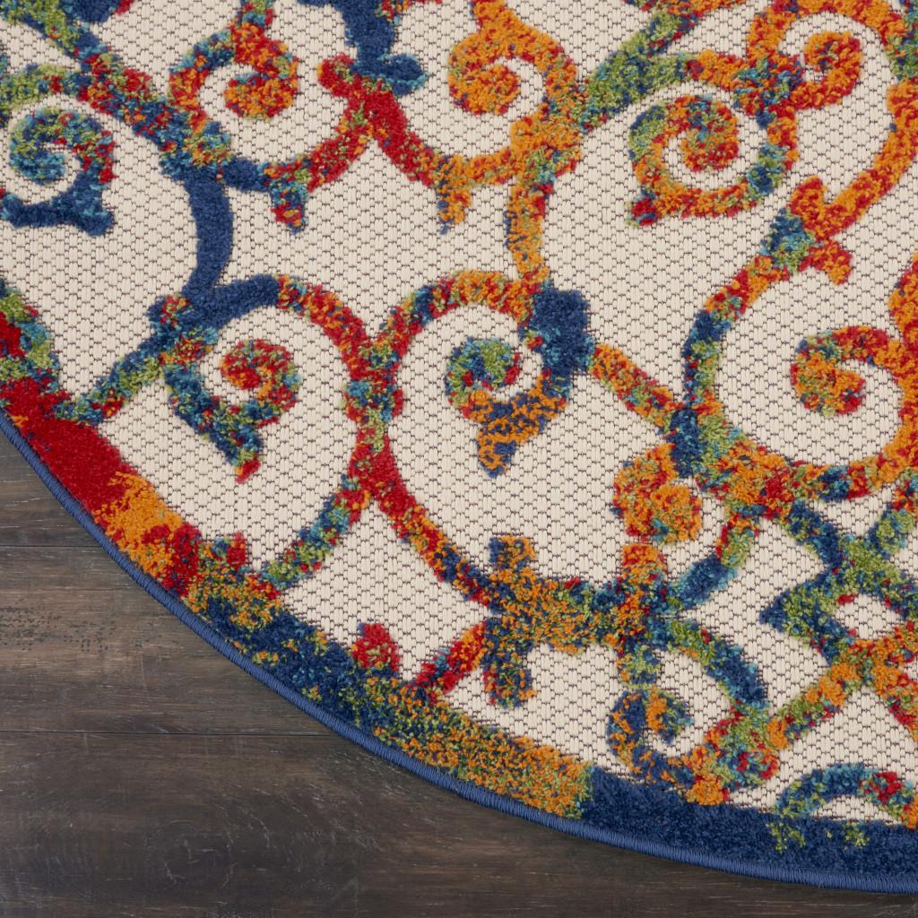 4' Ivory And Blue Round Indoor Outdoor Area Rug