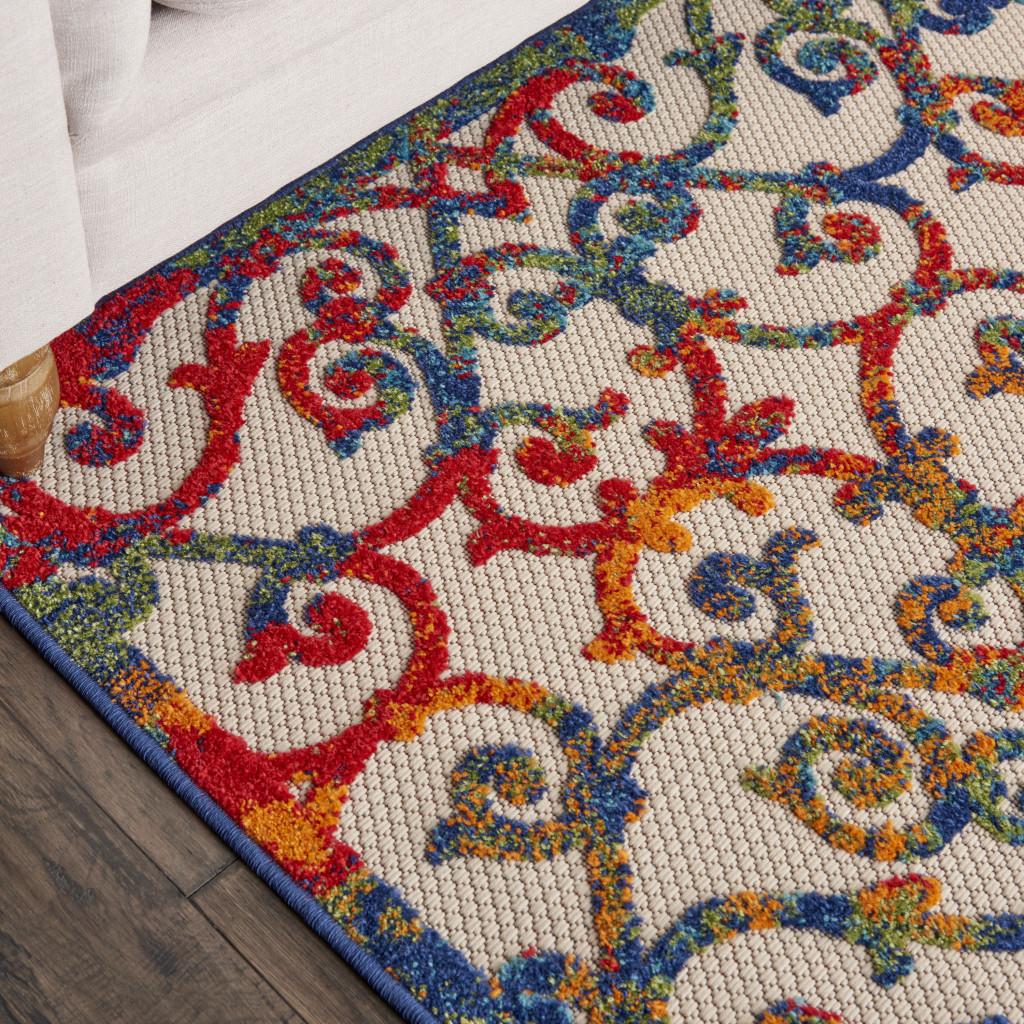 6' X 9' Ivory And Blue Indoor Outdoor Area Rug