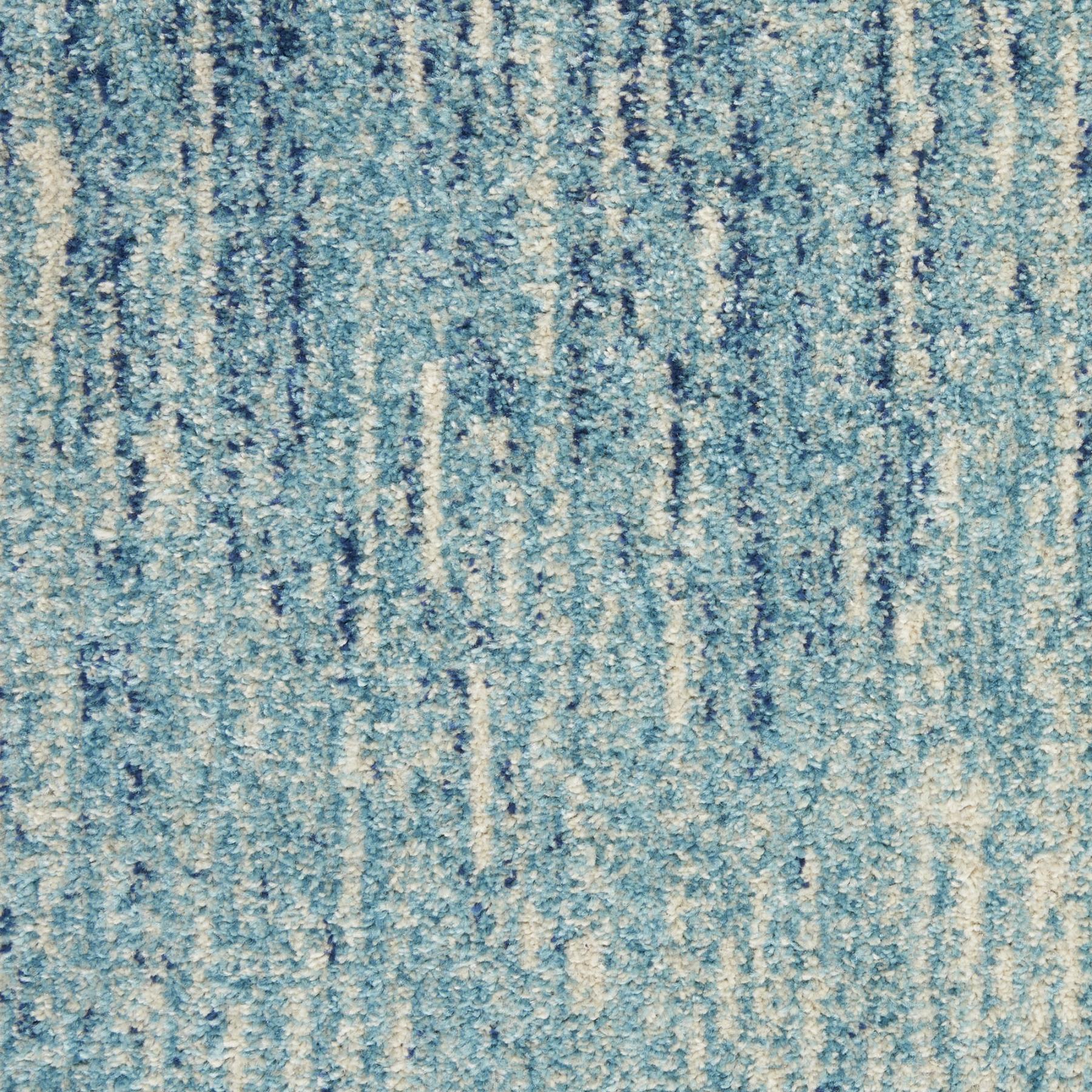 5' X 7' Blue And Ivory Abstract Area Rug
