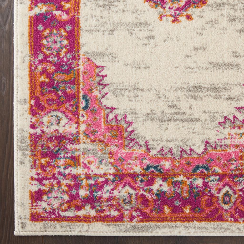 5' X 7' Ivory And Fuchsia Oriental Distressed Area Rug