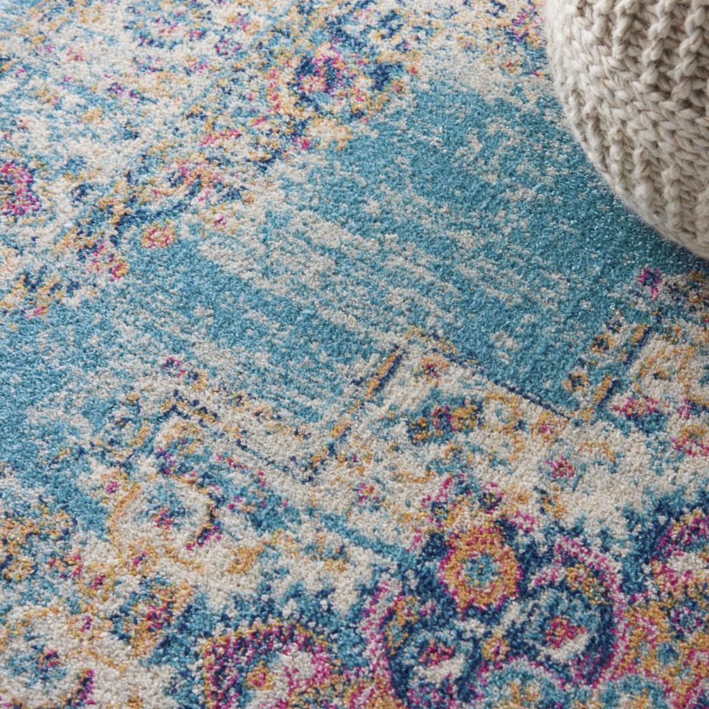 5' X 7' Blue And Ivory Southwestern Distressed Area Rug