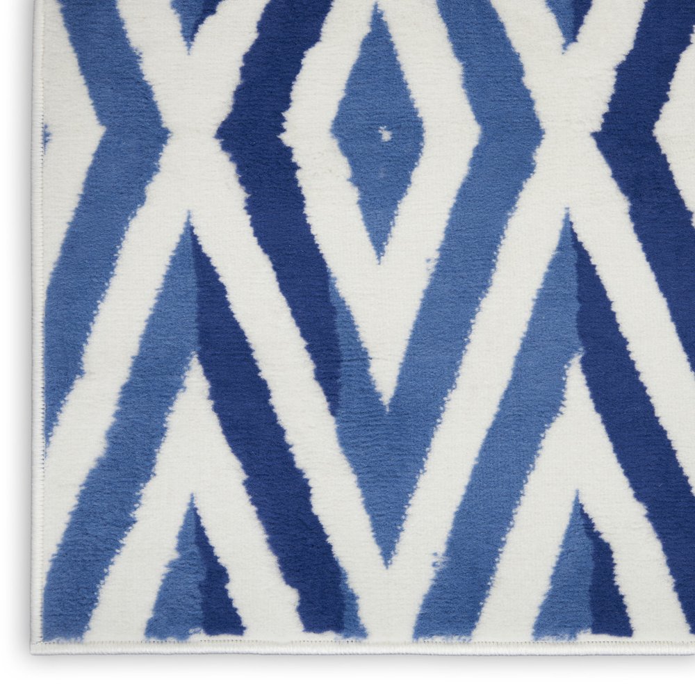 4' X 6' Ivory And Blue Geometric Area Rug
