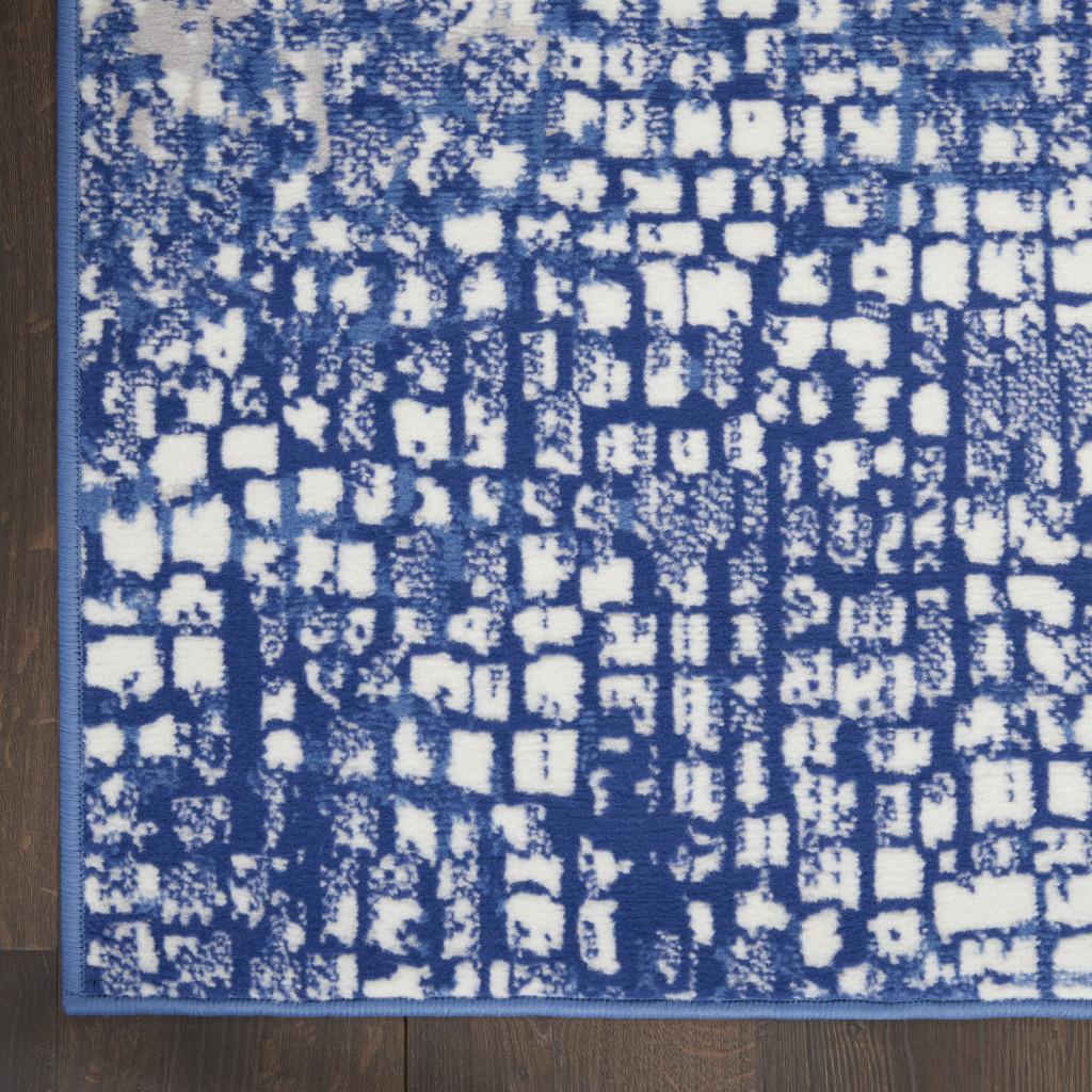 4' X 6' Ivory And Blue Geometric Area Rug
