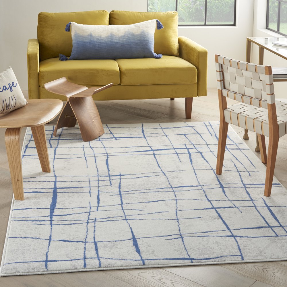 4' X 6' Ivory And Blue Geometric Distressed Area Rug