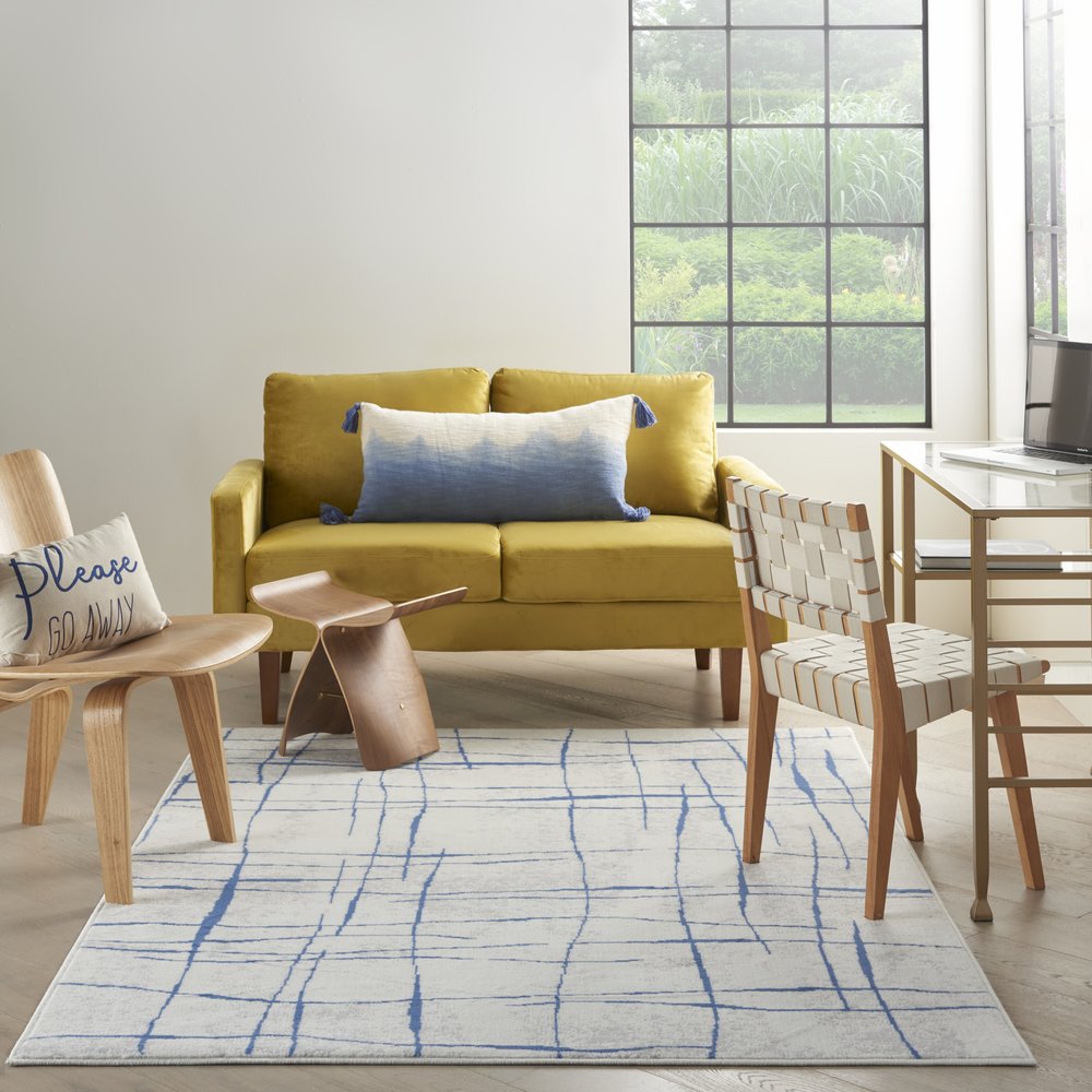 4' X 6' Ivory And Blue Geometric Distressed Area Rug