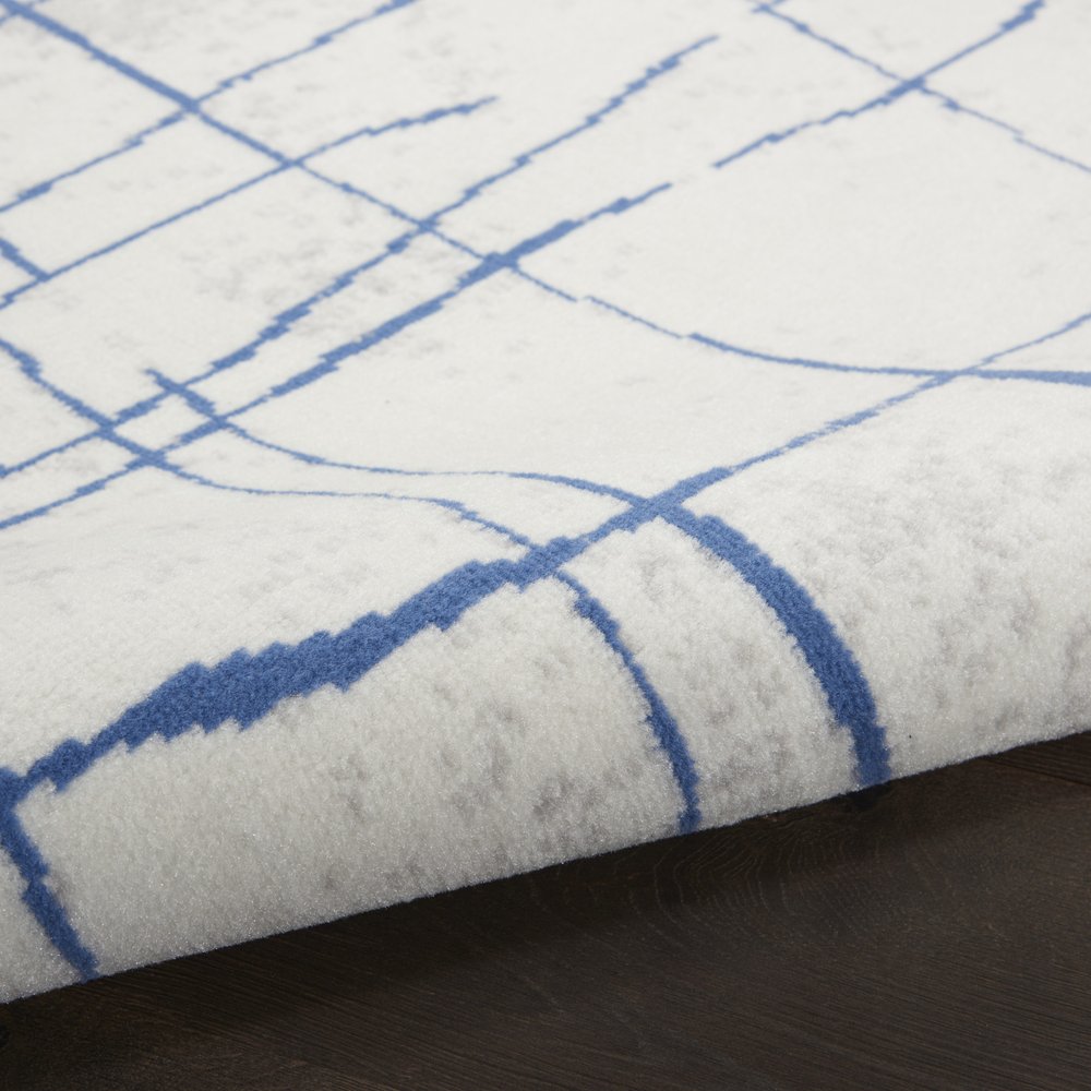 4' X 6' Ivory And Blue Geometric Distressed Area Rug