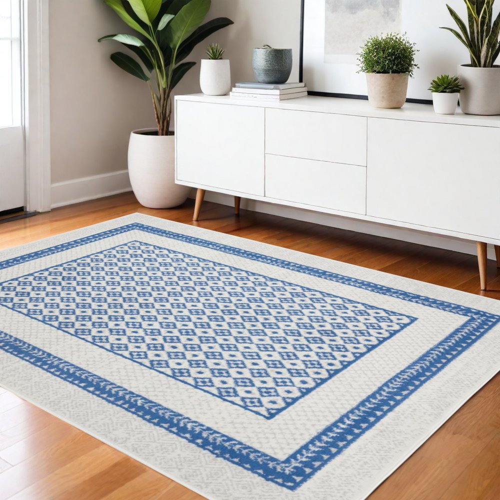 4' X 6' Ivory And Blue Geometric Area Rug