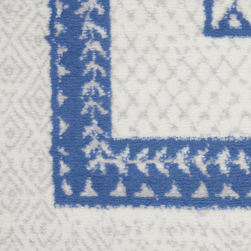 4' X 6' Ivory And Blue Geometric Area Rug