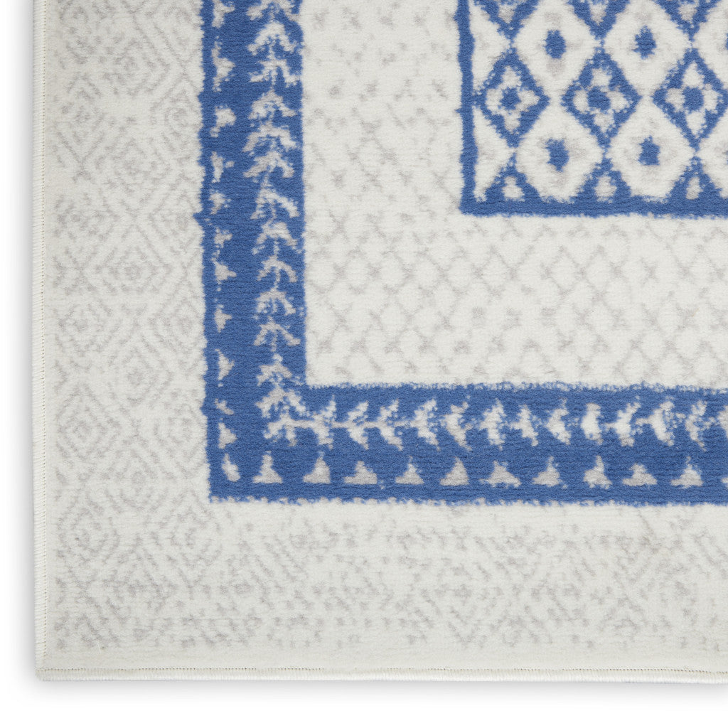 4' X 6' Ivory And Blue Geometric Area Rug
