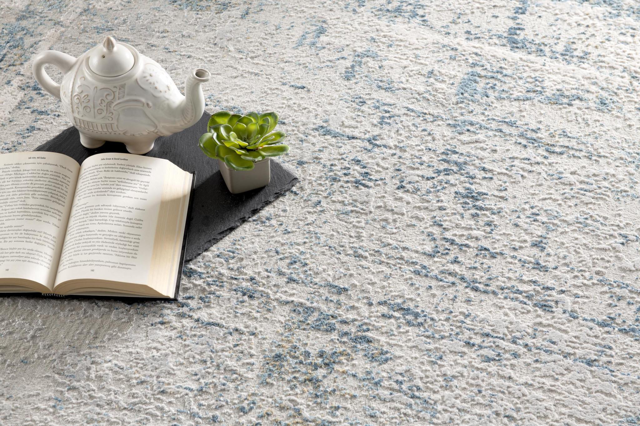 4' X 6' Blue and Ivory Abstract Power Loom Area Rug