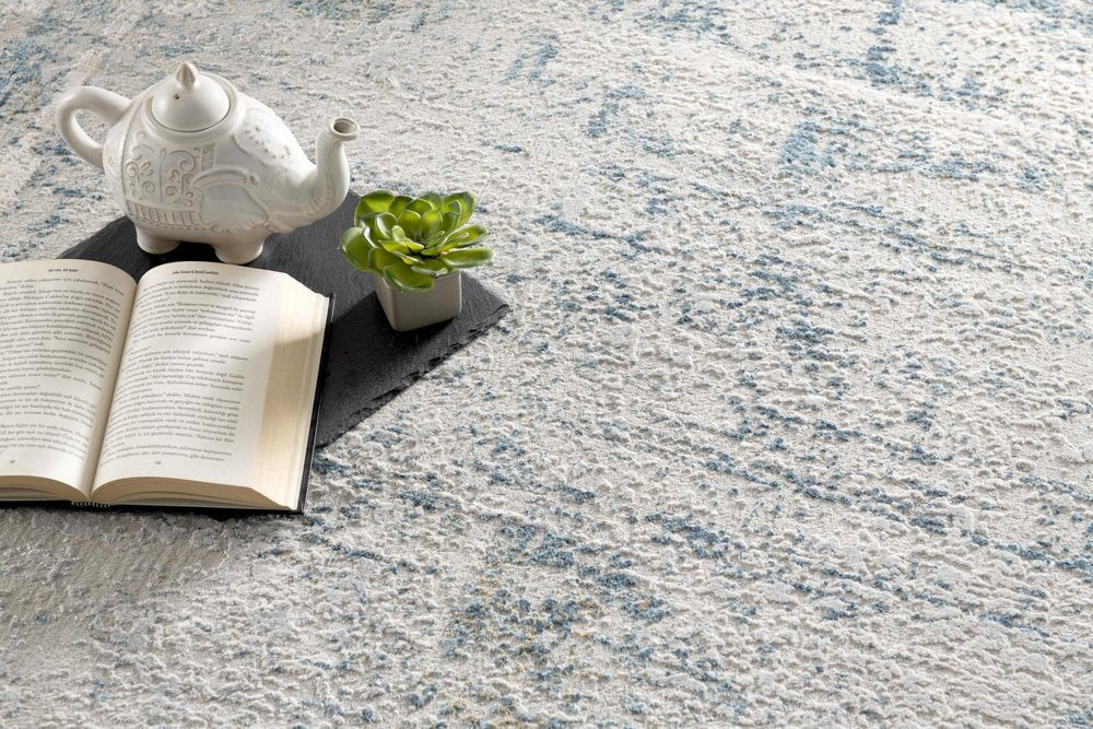 4' X 6' Blue and Ivory Abstract Power Loom Area Rug