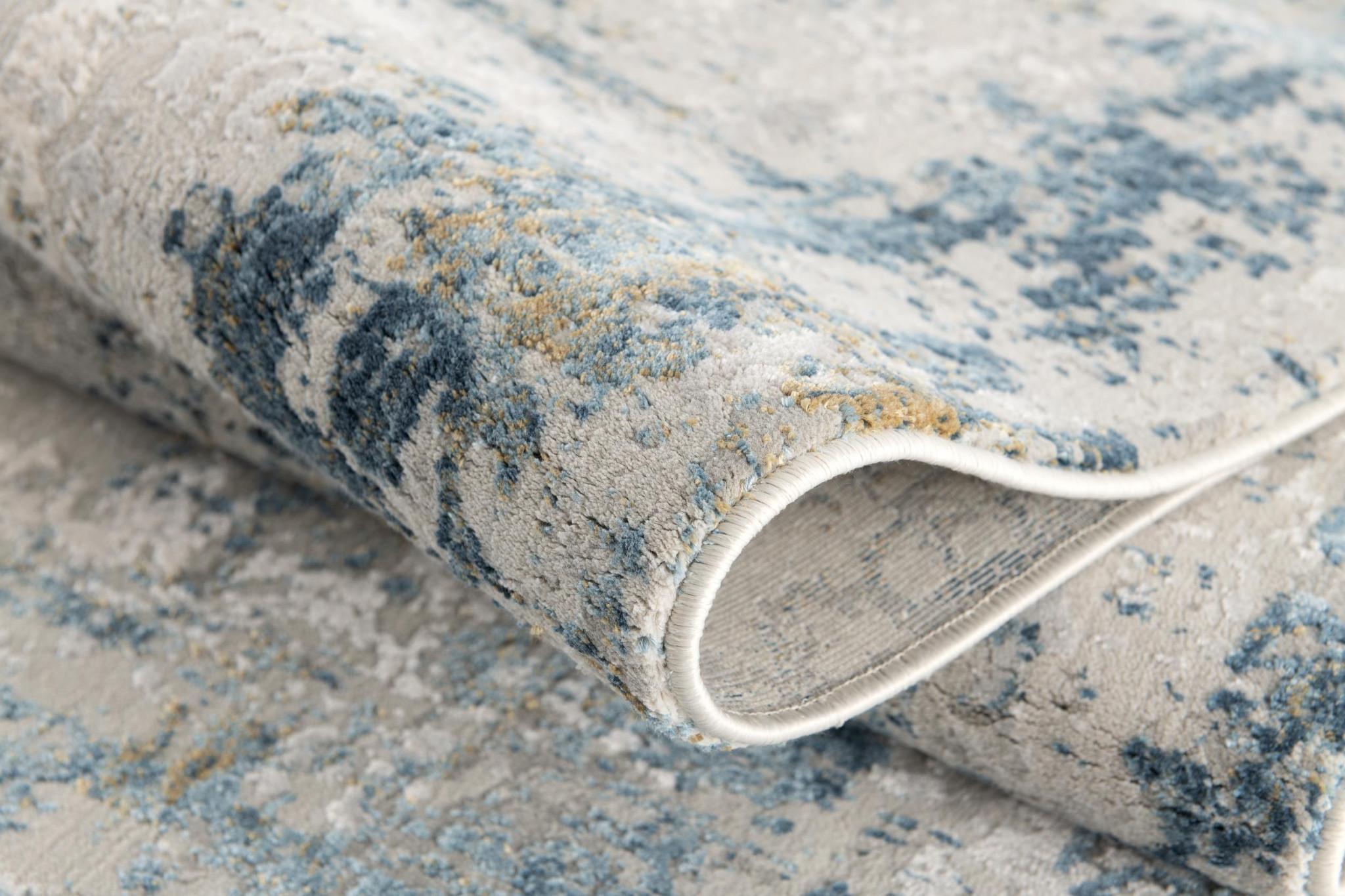 4' X 6' Blue and Ivory Abstract Power Loom Area Rug