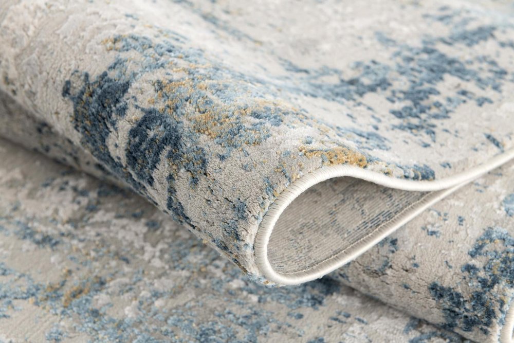 4' X 6' Blue and Ivory Abstract Power Loom Area Rug