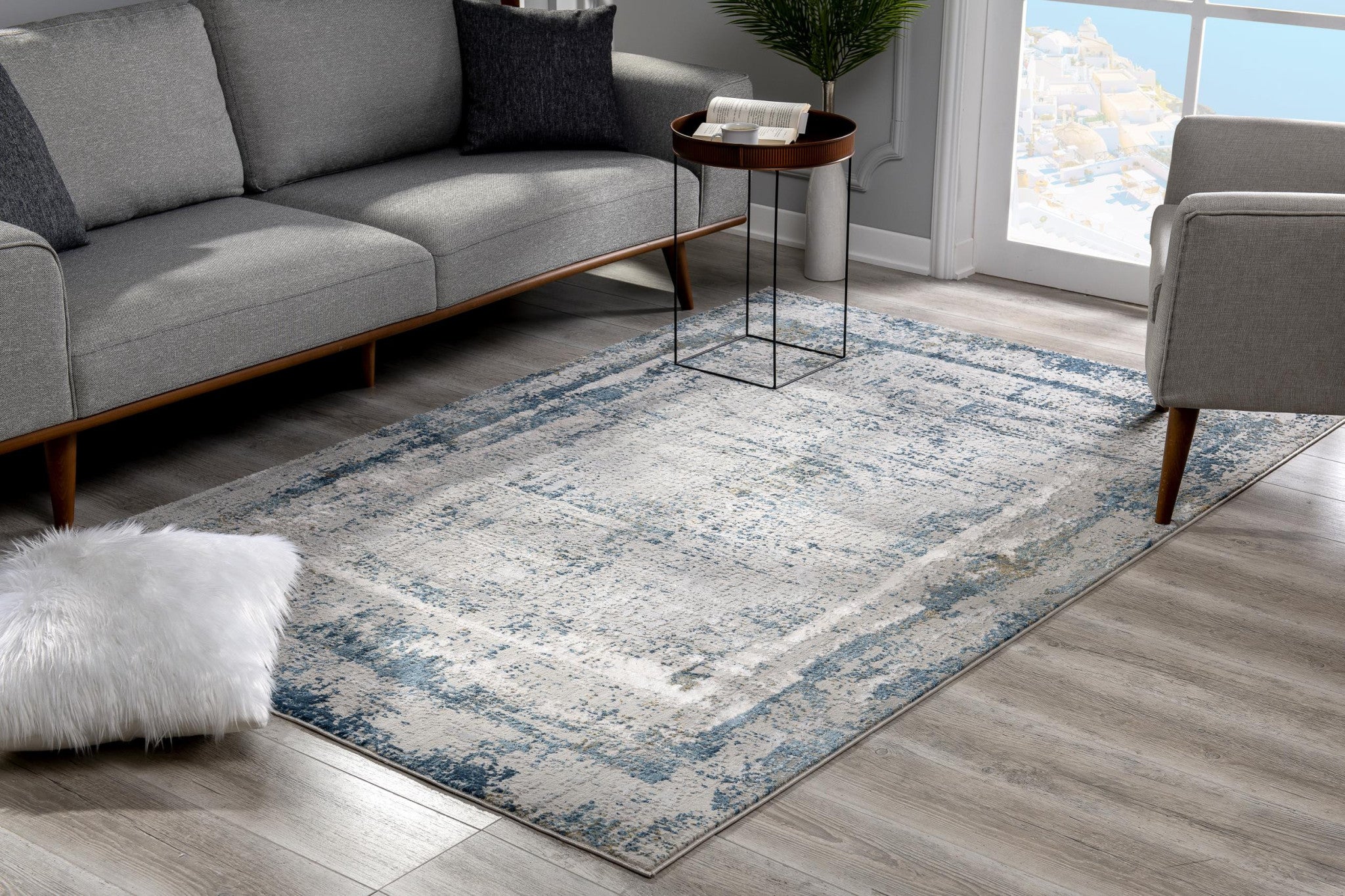 4’ X 6’ Ivory And Blue Abstract Distressed Area Rug