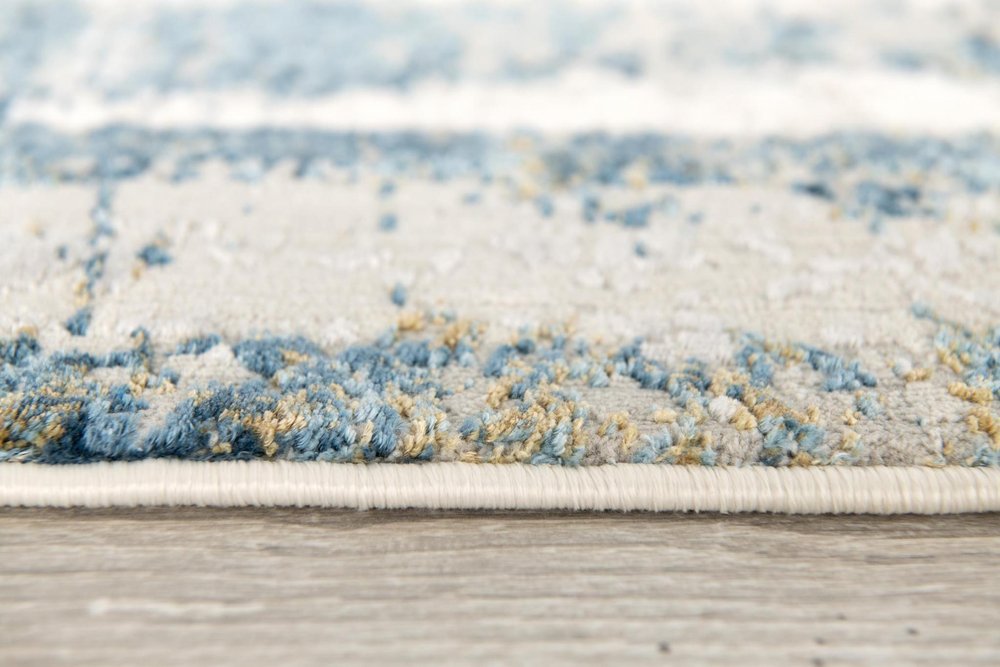 4' X 6' Blue and Ivory Abstract Power Loom Area Rug