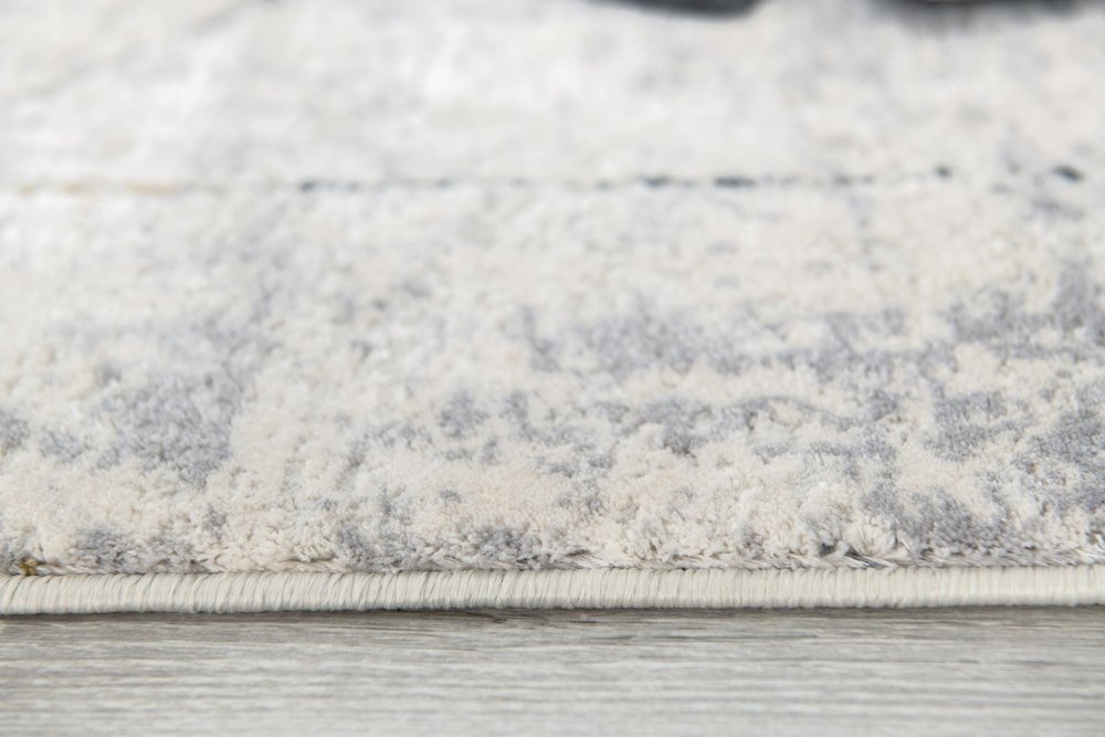4' X 6' Gray and Ivory Abstract Power Loom Area Rug