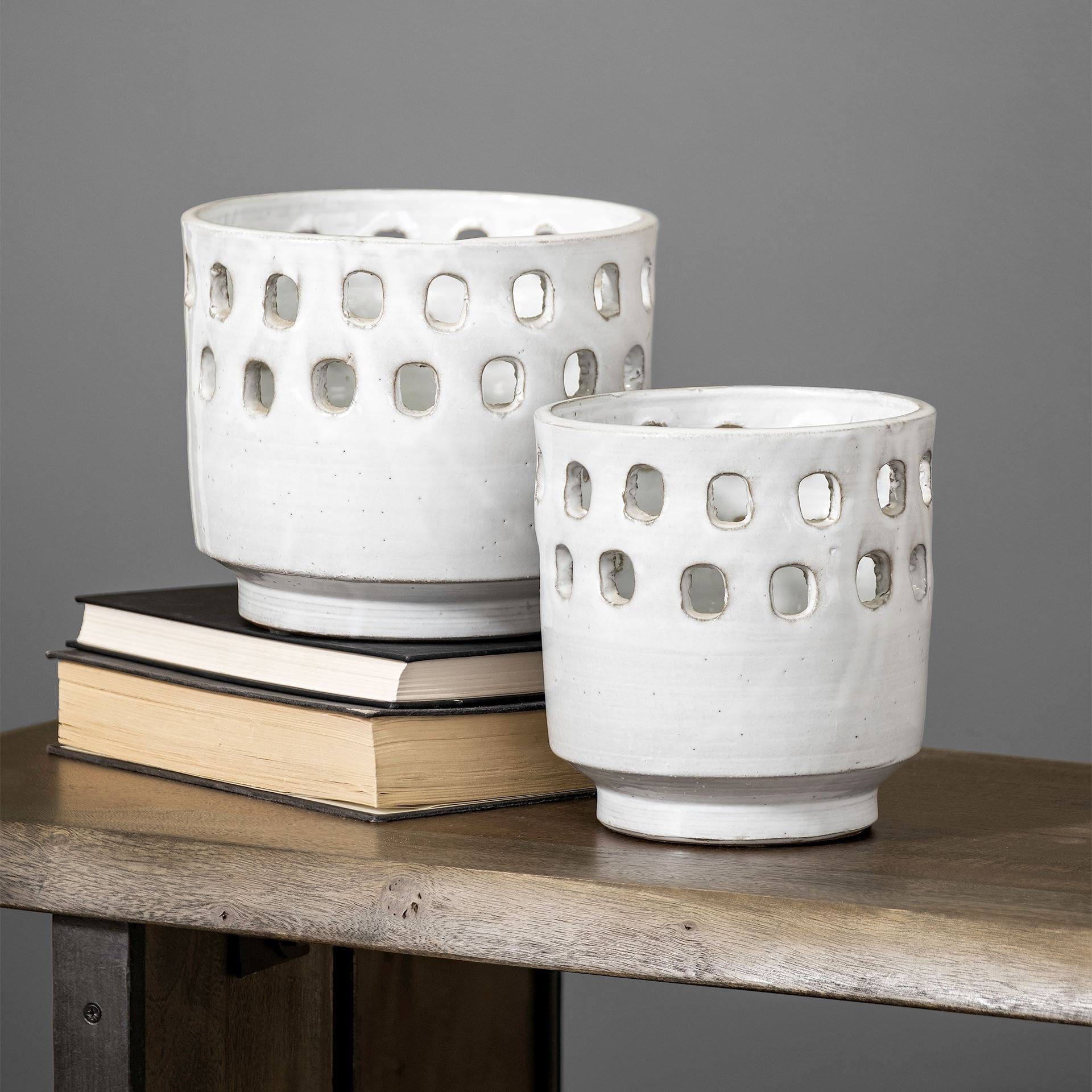 Set of Two White Ceramic Vases with Hollow Details