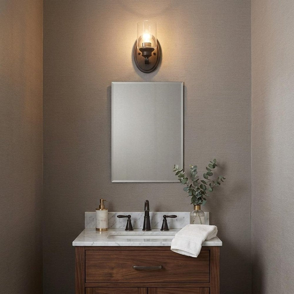 One Light Bronze Wall Light with Clear Glass Shade