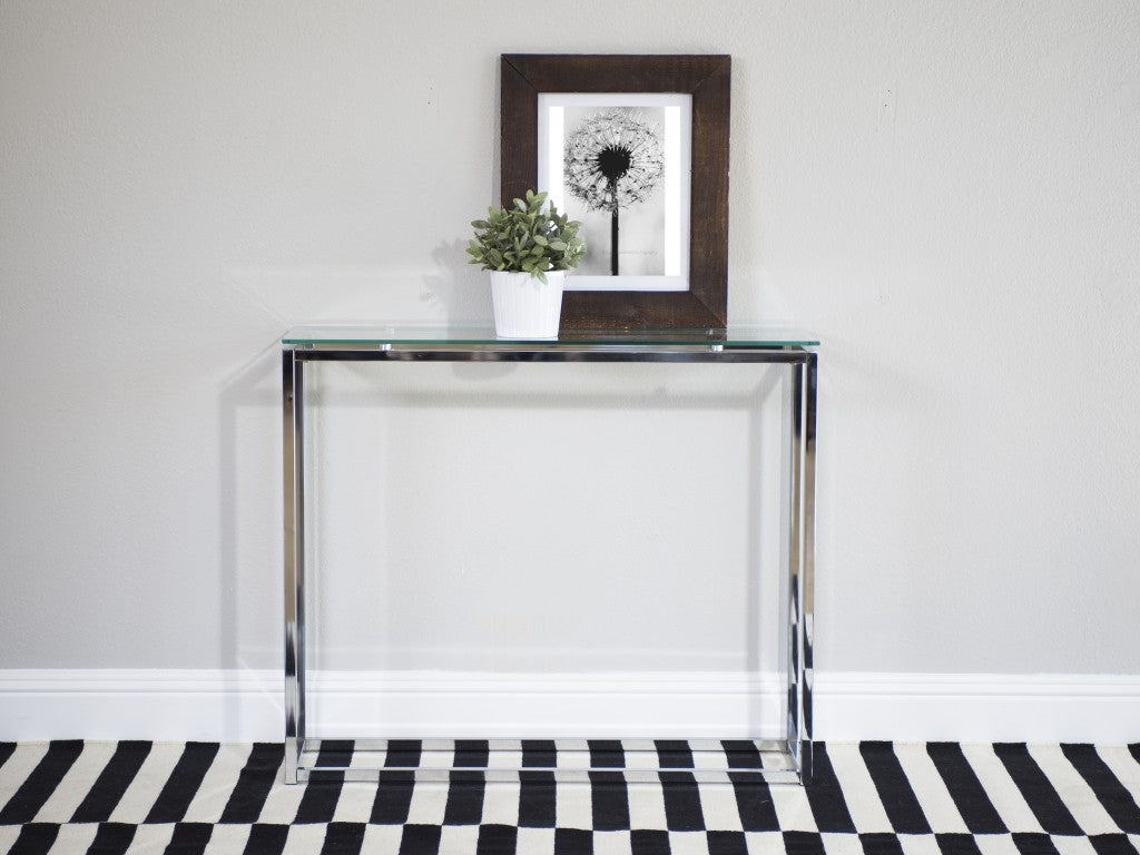 36" Clear and Silver Glass Sled Console Table