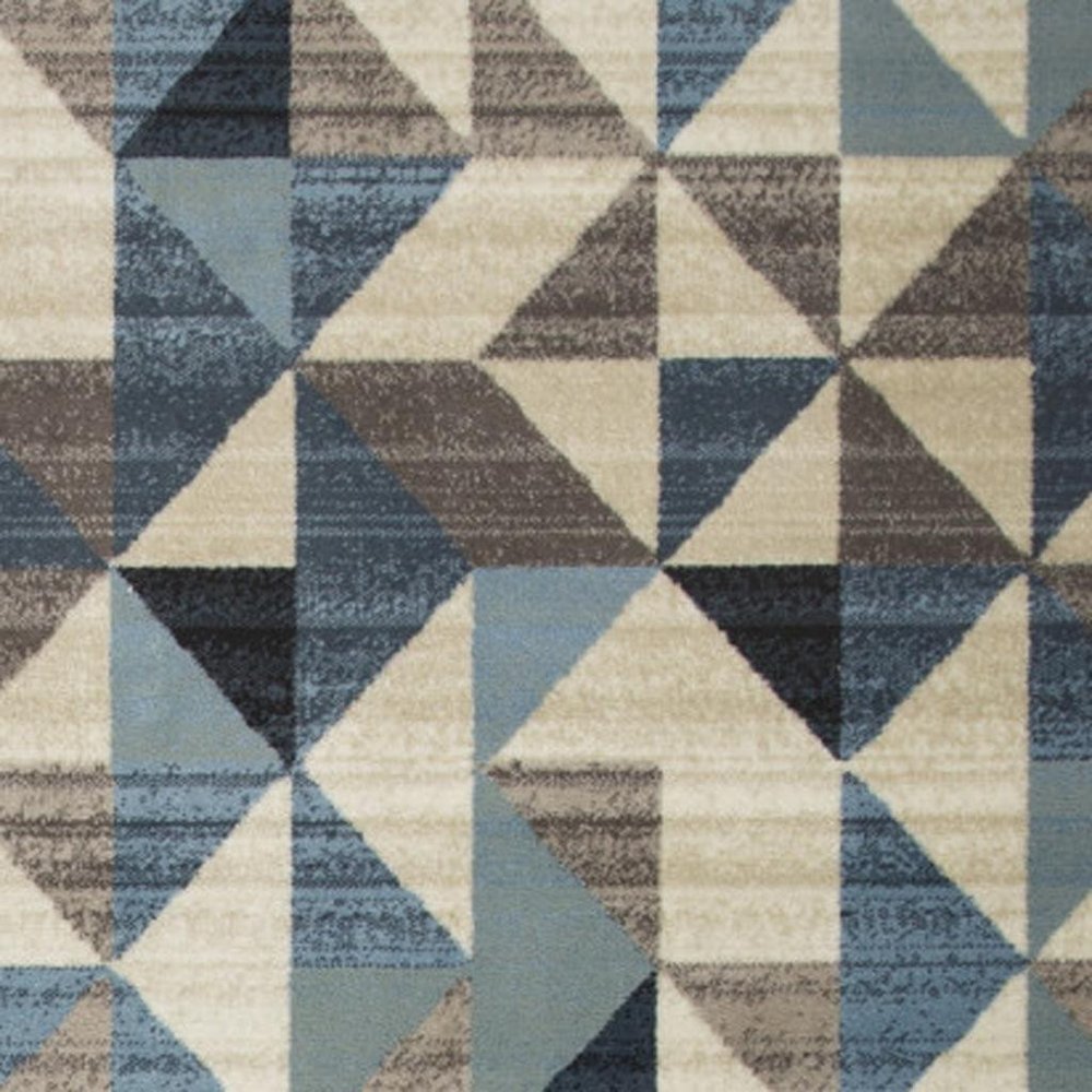 5' X 8' Beige Blue And Gray Geometric Area Rug