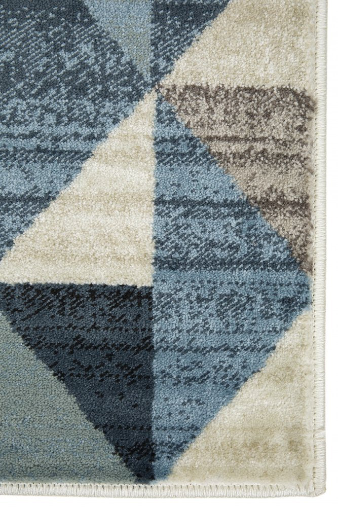 5' X 8' Beige Blue And Gray Geometric Area Rug