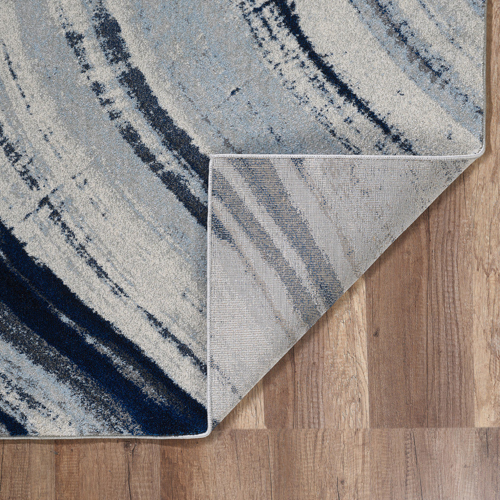 5' X 8' Ivory and Blue Abstract Area Rug