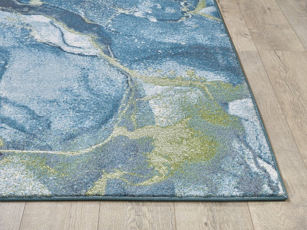 7' X 10' Teal Blue Green And Ivory Abstract Area Rug