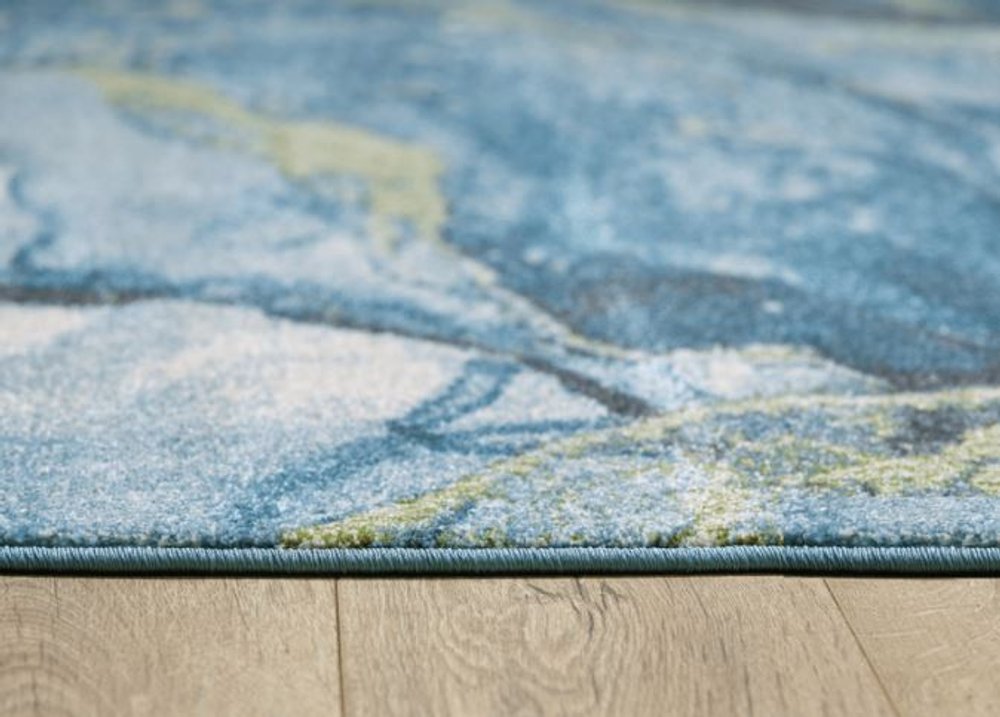 7' X 10' Teal Blue Green And Ivory Abstract Area Rug