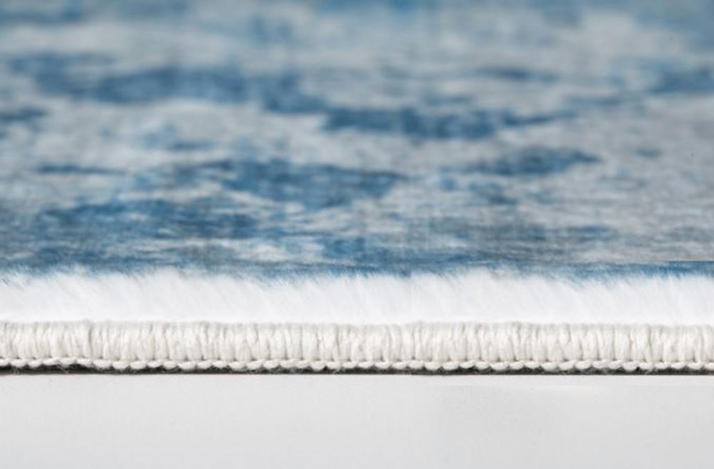 8' X 10' Blue And Ivory Abstract Area Rug