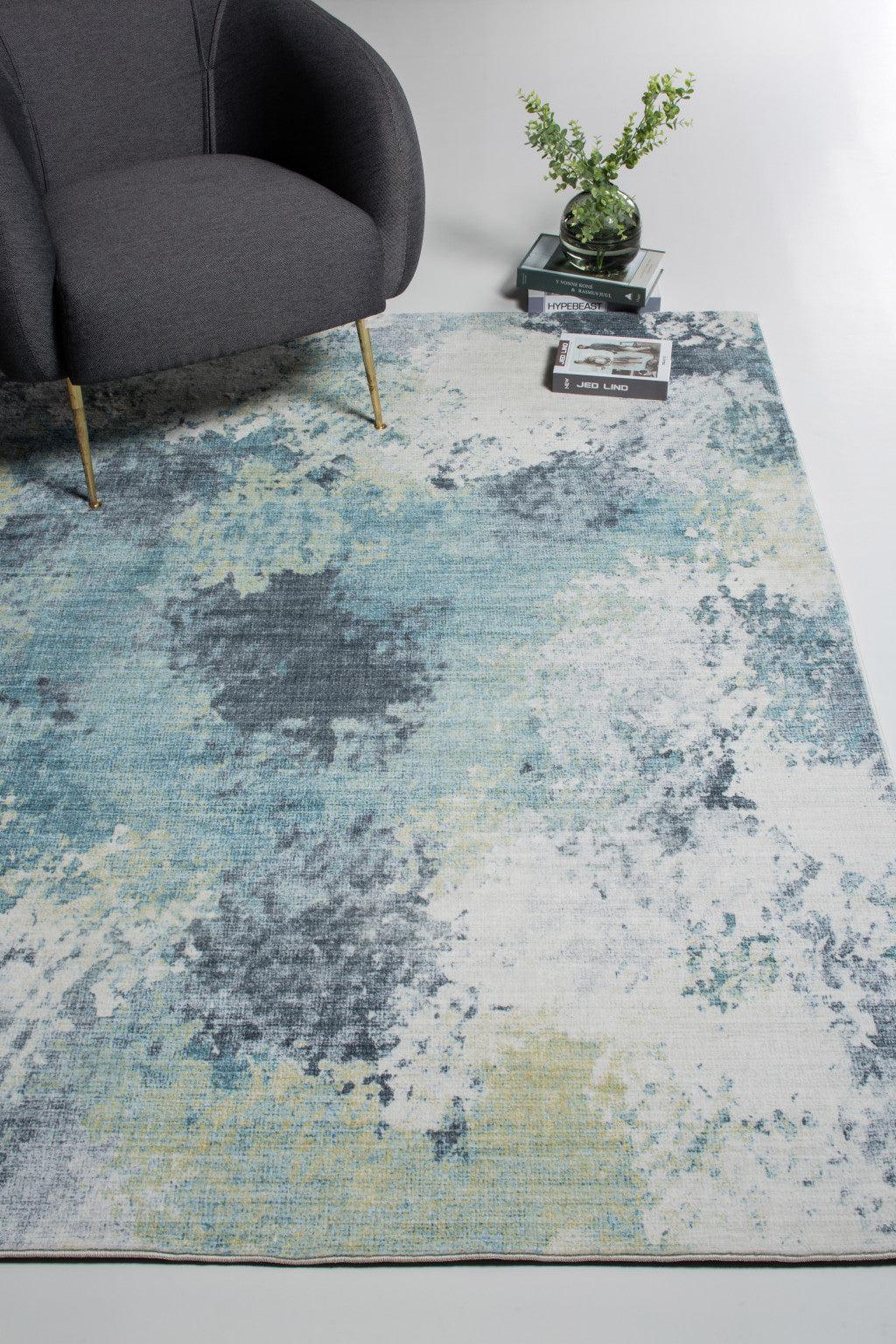 8' X 10' Blue and Ivory Abstract Area Rug