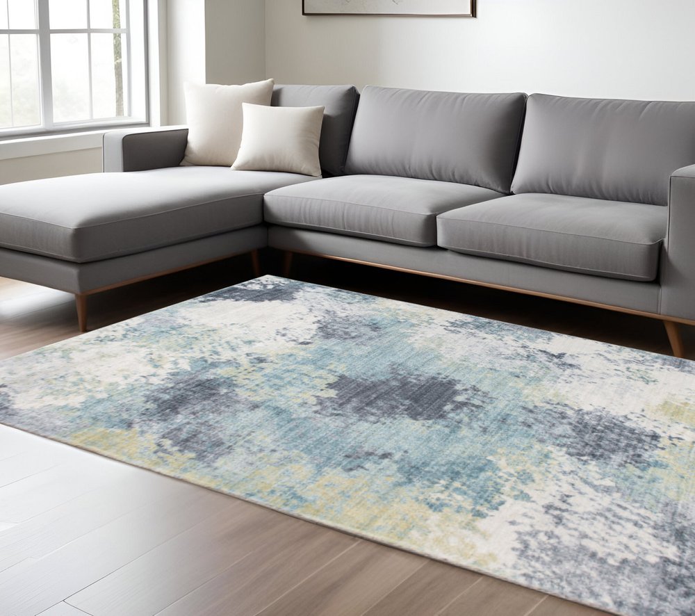 8' X 10' Blue and Ivory Abstract Area Rug