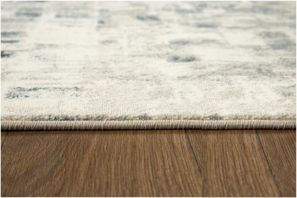5' X 8' Blue and Beige Abstract Area Rug